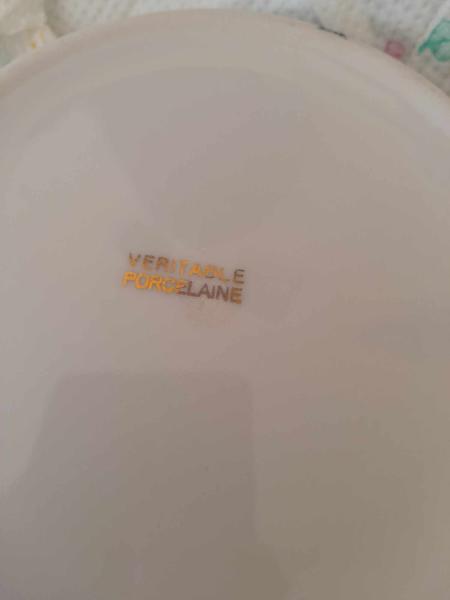 Vente Ancienne assiette à bouillie en porcelaine