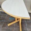 Annonce Baumann france, table ronde demi-lune bois naturel