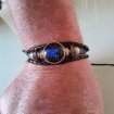 Annonce Bracelet h / f en avec motif pierre bleue ajustabl