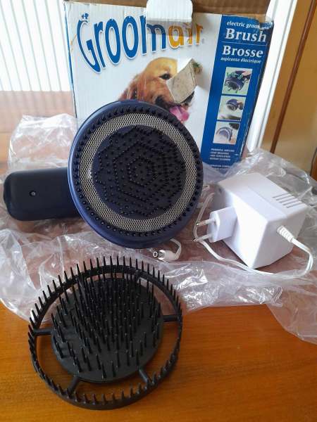 Annonce Brosse de toilettage aspirante électrique