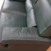 Canapé 2 places et fauteuil cuir vert