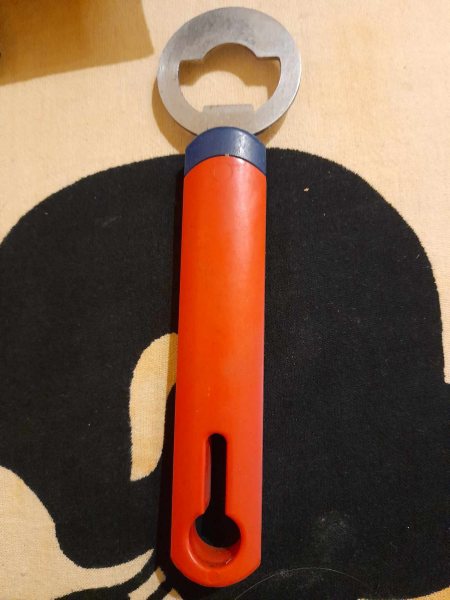 Décapsuleur  en plastique et inox