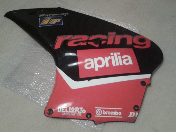 Flanc car&eacute;nage gauche aprilia 125 rs 2004