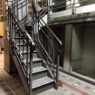 Escalier quart tournant + garde corps acier laiton
