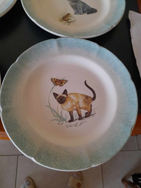 Annonce Lot 4 assiettes en pocelaine signé monika heller c