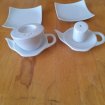 Lot poivrier, salière, coupelles en porcelaine