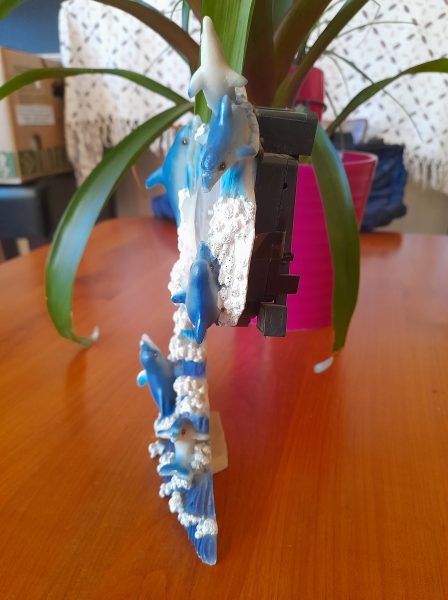 Pendule de table en c&eacute;ramique  avec dauphin pas cher