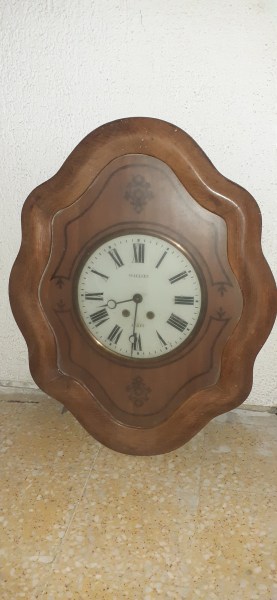 Pendule oeil de boeur