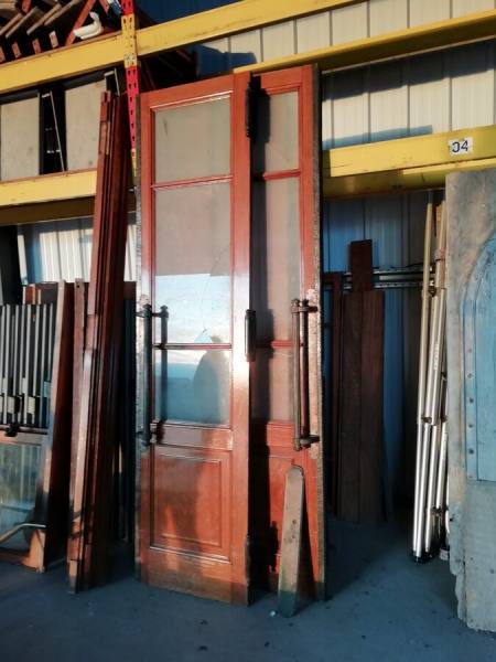 Porte ancienne en ch&ecirc;ne et laiton