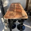 Table haute en bois exotique 4 tabourets
